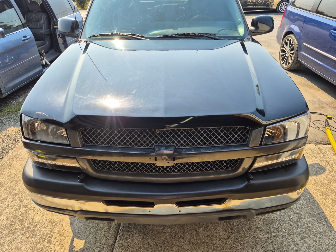Freshly detailed truck grille with a deep, glossy shine after an S&M Auto Detailing wash